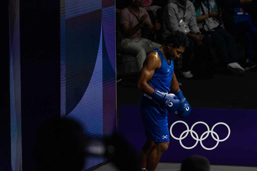 John Ume Team Papua New Guinea walking into the ring at Olympic Games on the 27th July, 2024 at the Rolland Garros in Paris, France. (Image by Casey Sims-ONOC Communications)