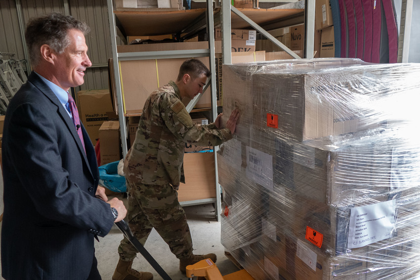 Ambassador Scott Brown with Technical Sergeant (TSgt.) Curtis Hoofman, USAF