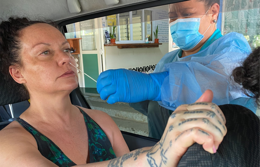 Visitor Lisa Taouma gets tested at the Tupapa/Maraerenga Drive Through testing station