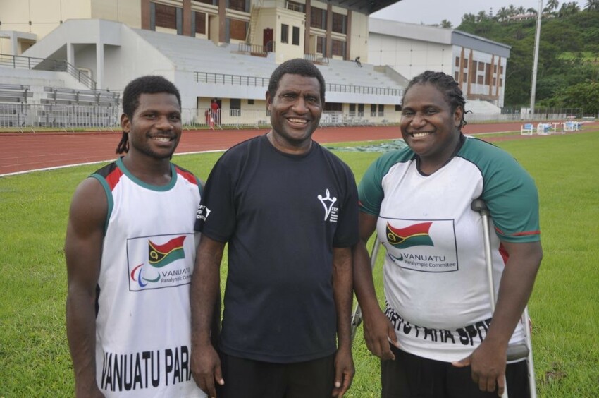 Photo of team Vanuatu: Team Vanuatu athletes Ken Kahu and Elie Enock with para-sport coach Deni Kalanga who scouted Ken while the para-javelin thrower was walking to the shop. Pc: https://www.thegoodnewsmovement.com/vanuatu-para-athletes-overcome-inc